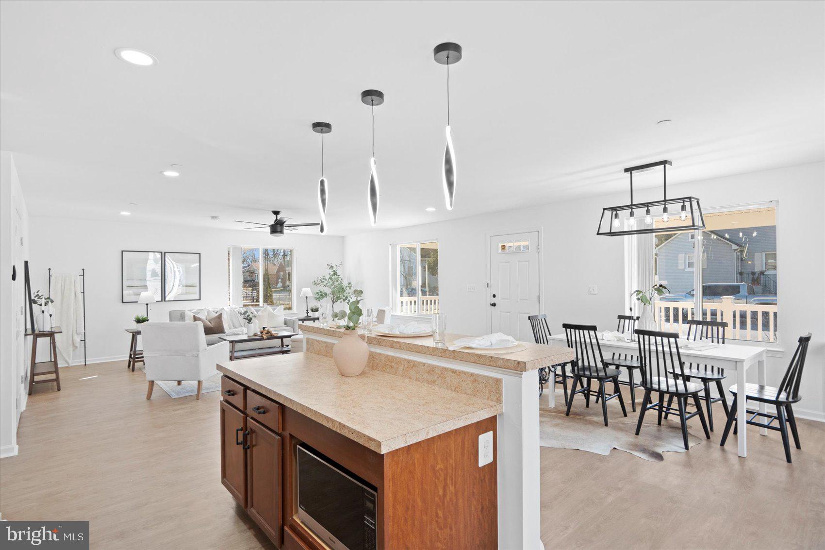 313 Homberg Avenue Baltimore, MD 21221 - Photo 15 of 47 a large kitchen with lots of counter space a sink and appliances