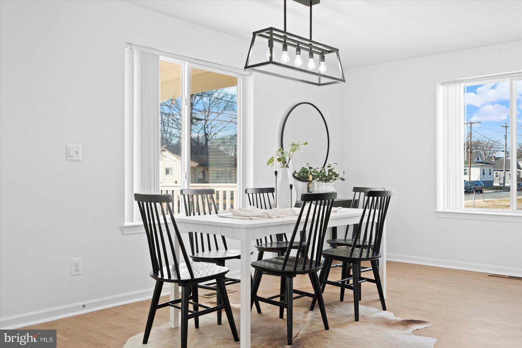 313 Homberg Avenue Baltimore, MD 21221 - Photo 17 of 47 a view of a dining room with furniture window and outside view