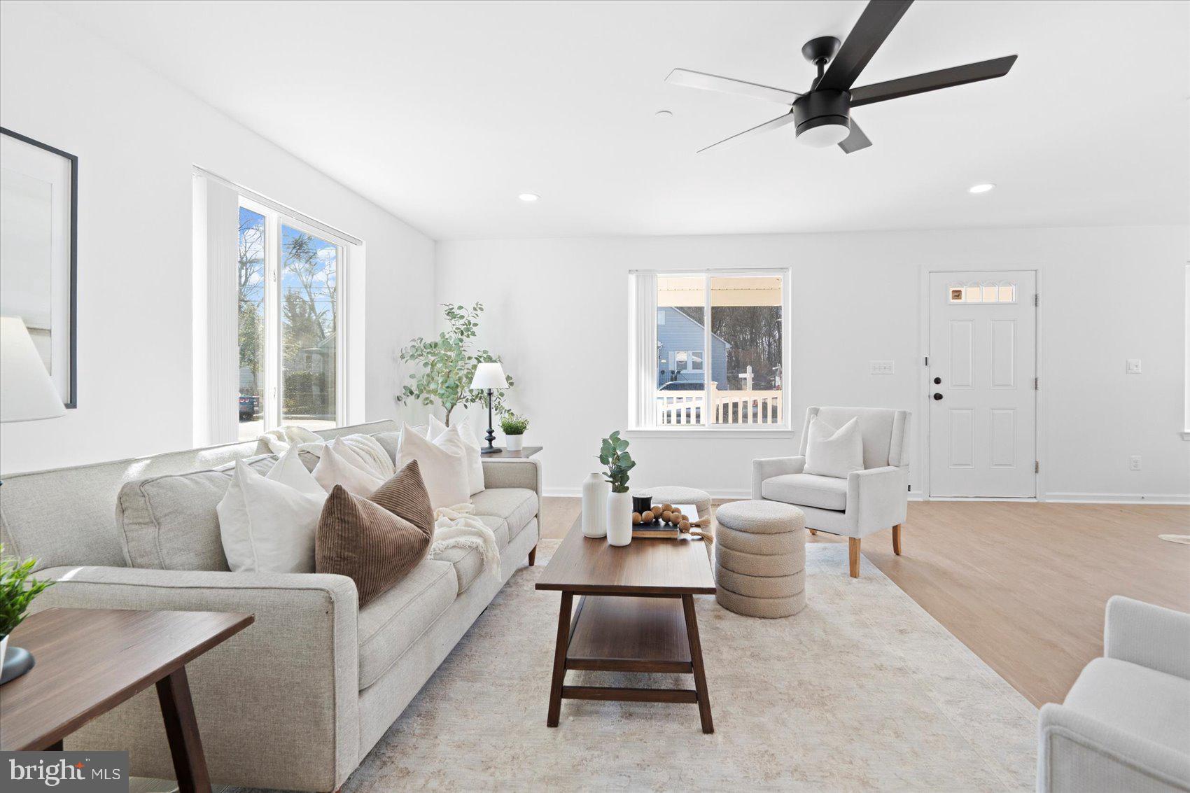 313 Homberg Avenue Baltimore, MD 21221 - Photo 24 of 47 a living room with furniture and a large window