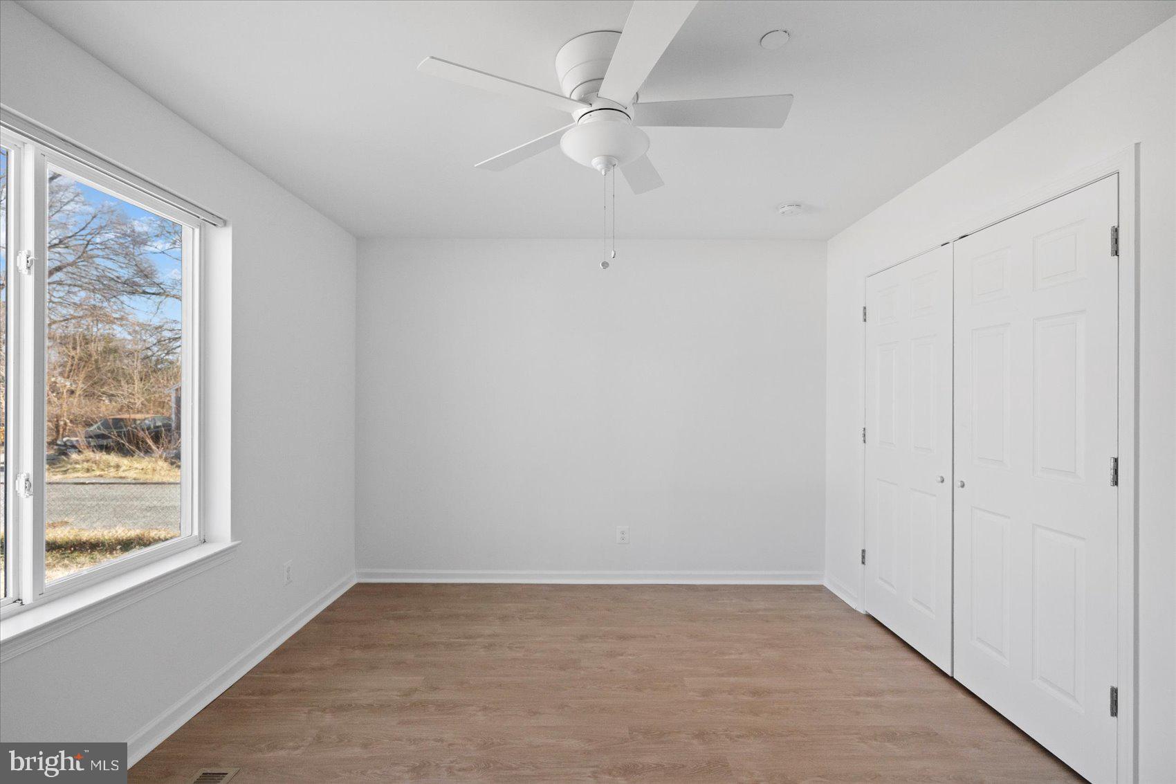 313 Homberg Avenue Baltimore, MD 21221 - Photo 40 of 47 a view of an empty room with a window
