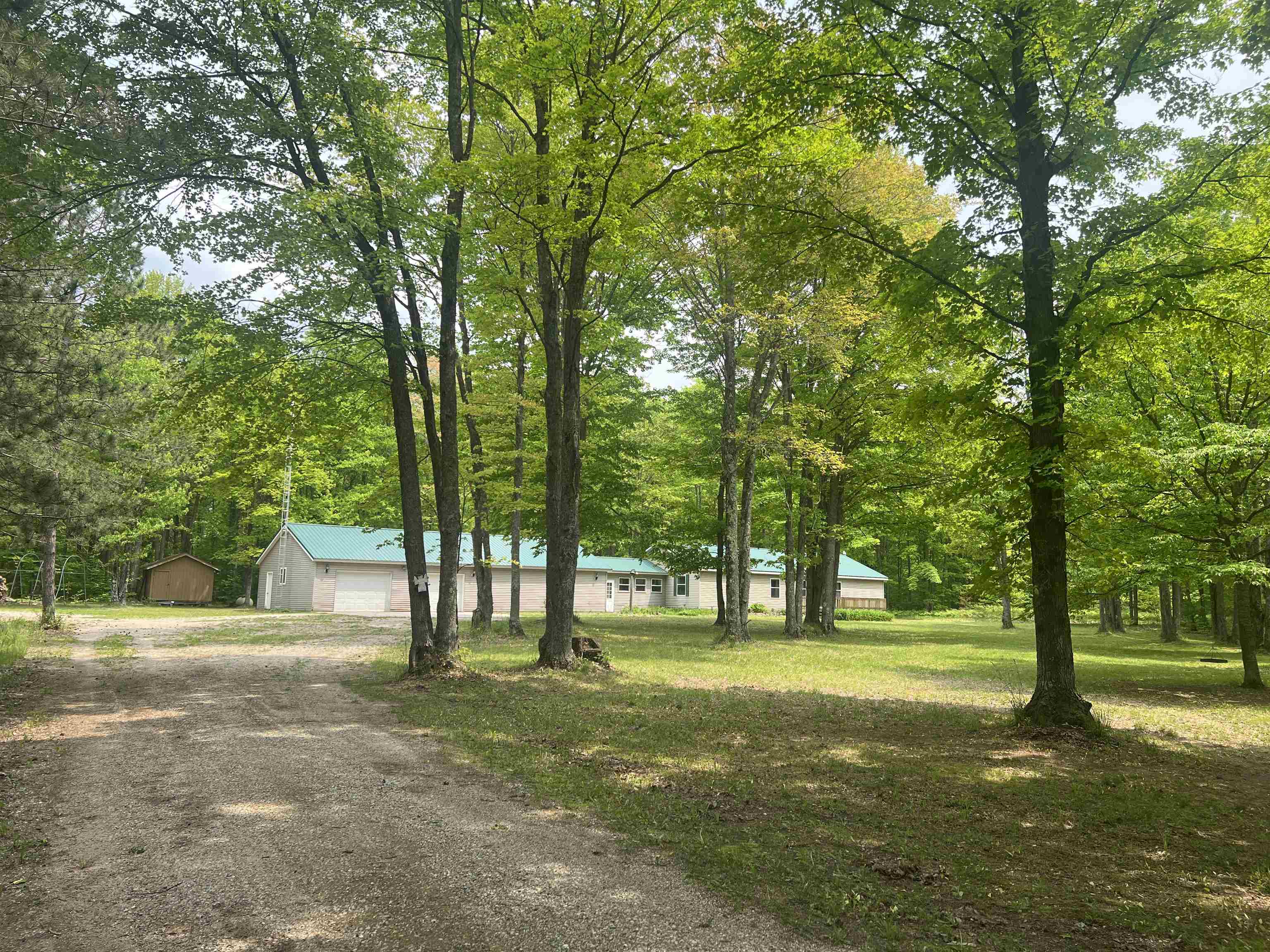 135 Montgomery Road Southwest South Boardman, MI 49680 - Photo 1 of 59
