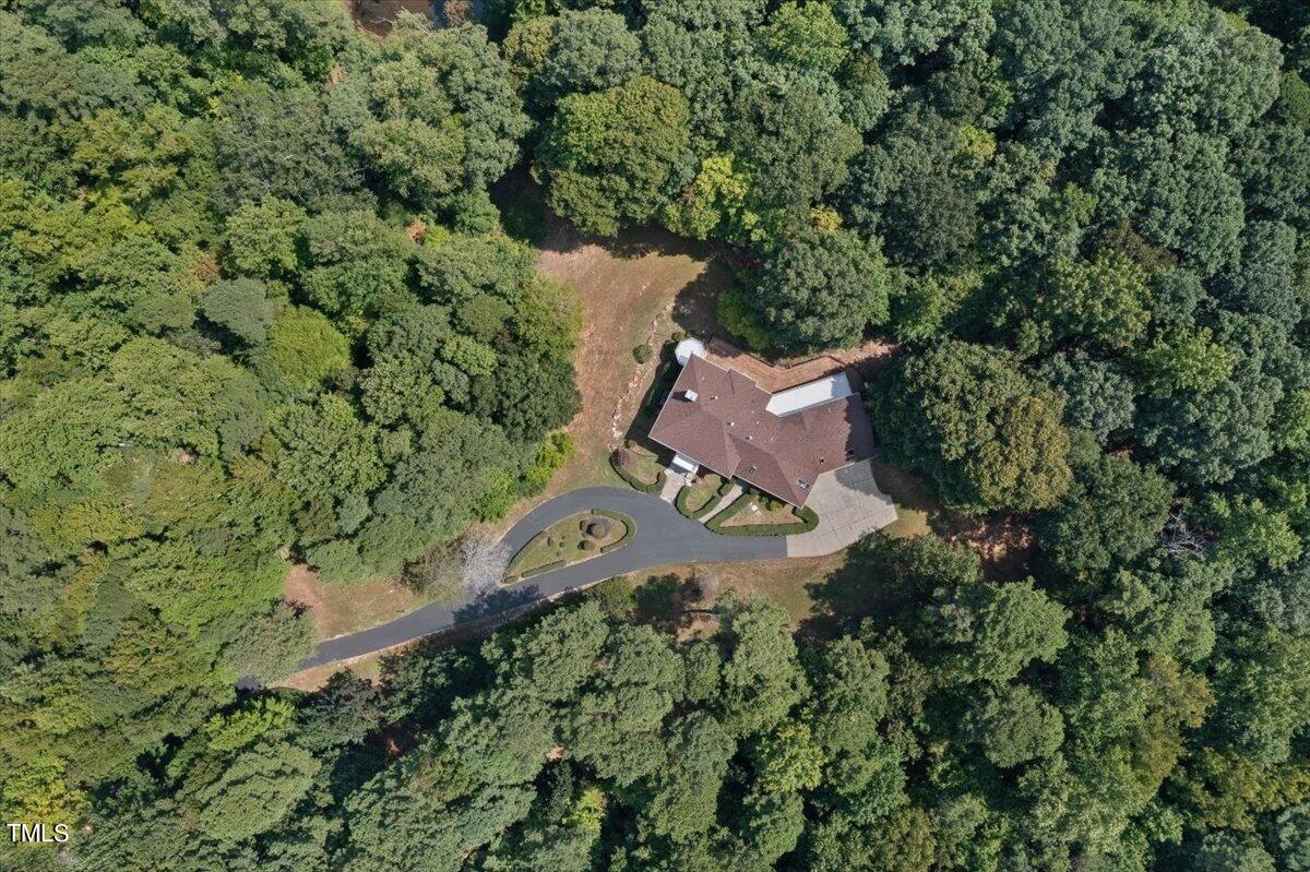 6300 Swallow Cove Lane Raleigh, NC 27614 - Photo 65 of 67 an aerial view of a house with a yard