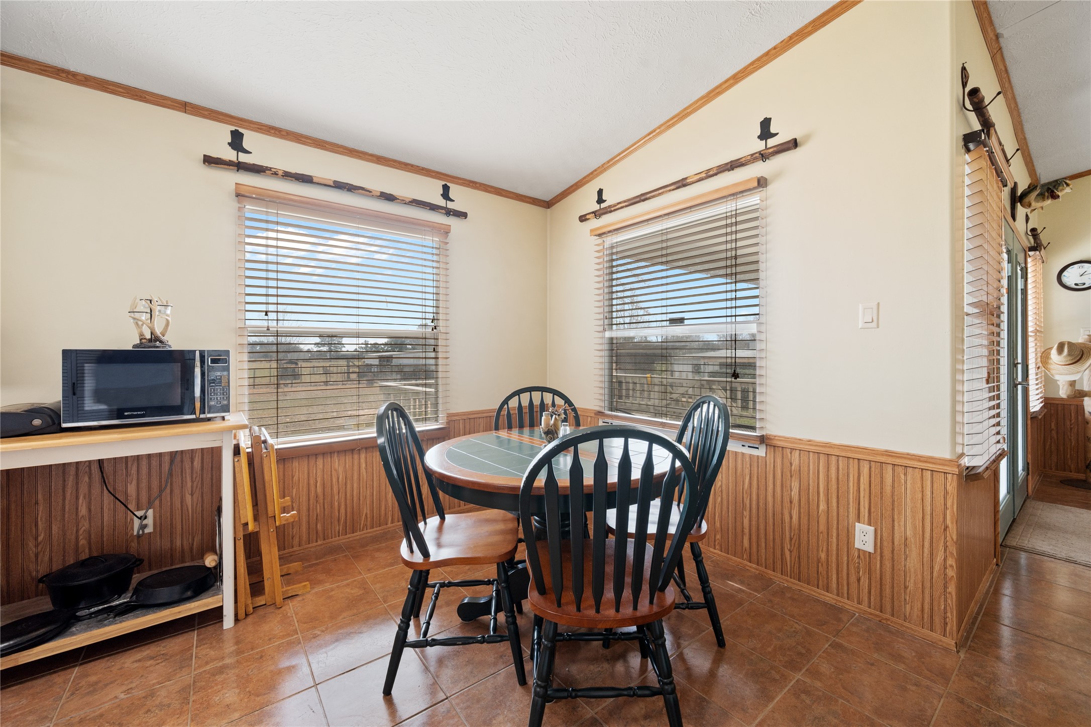 290 County Road 2286 Cleveland, TX 77327 - Photo 11 of 37 a view of a dining room with furniture window and outside view