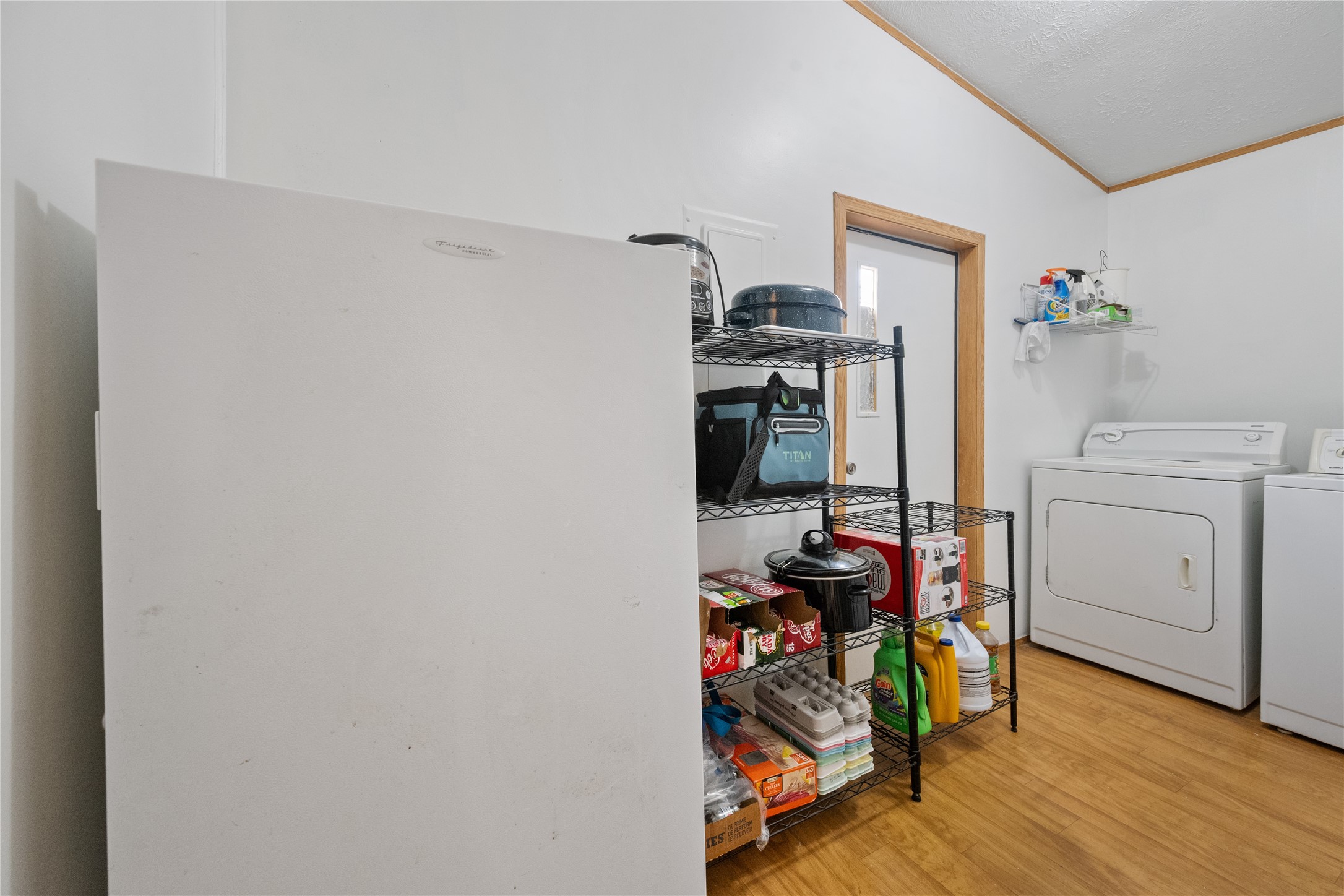290 County Road 2286 Cleveland, TX 77327 - Photo 20 of 37 a view of a room with gym equipment