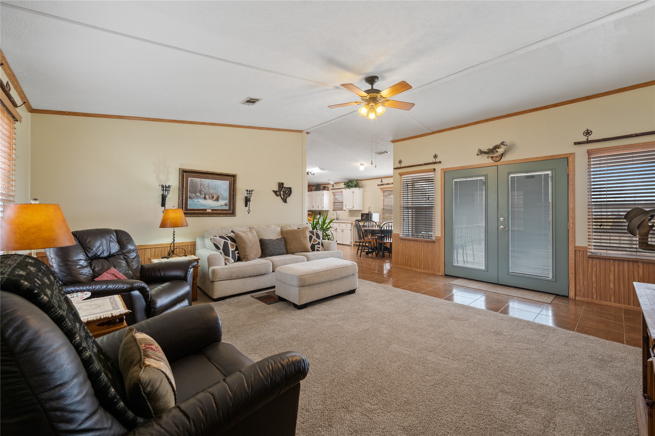 290 County Road 2286 Cleveland, TX 77327 - Photo 4 of 37 Living room opens up into the kitchen