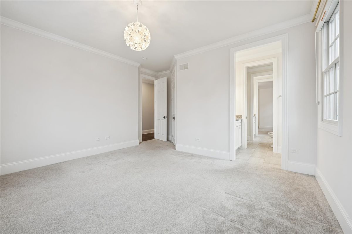 726 Lincoln Street Evanston, IL 60201 - Photo 27 of 46 a view of an empty room with a window