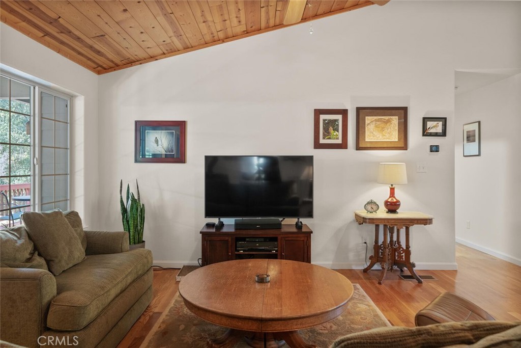 5056 Hooper Lane Chico, CA 95928 - Photo 11 of 57 a living room with furniture and a flat screen tv
