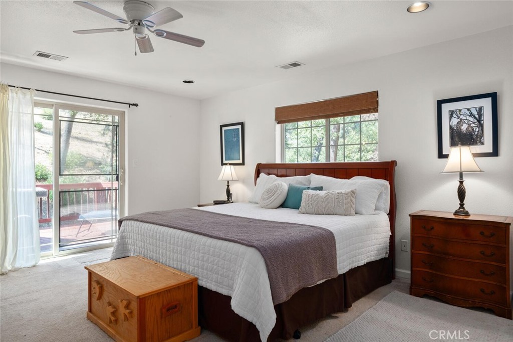 5056 Hooper Lane Chico, CA 95928 - Photo 19 of 57 Large primary bedroom with access to patio.