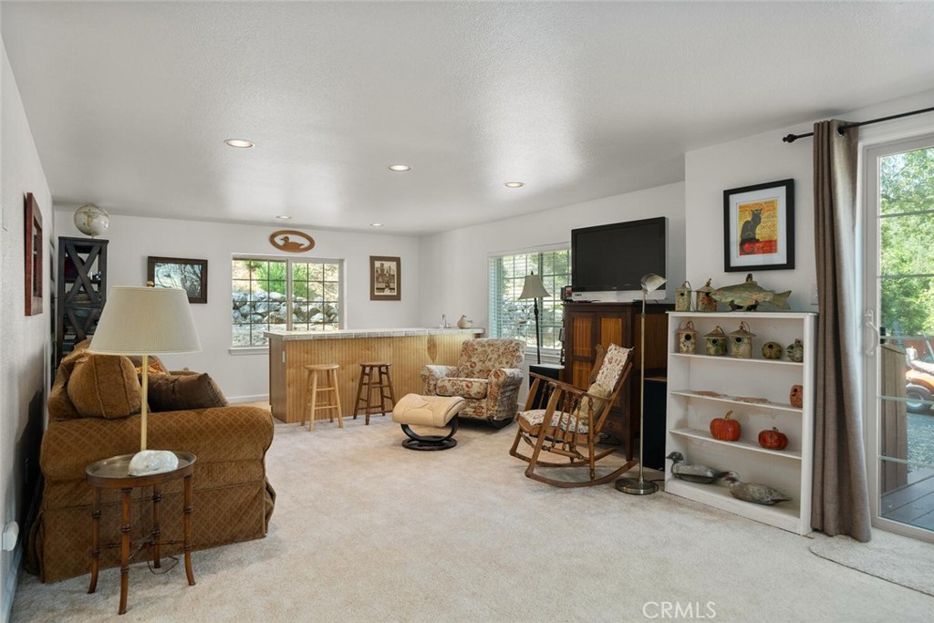 5056 Hooper Lane Chico, CA 95928 - Photo 33 of 57 a livingroom with furniture and a flat screen tv