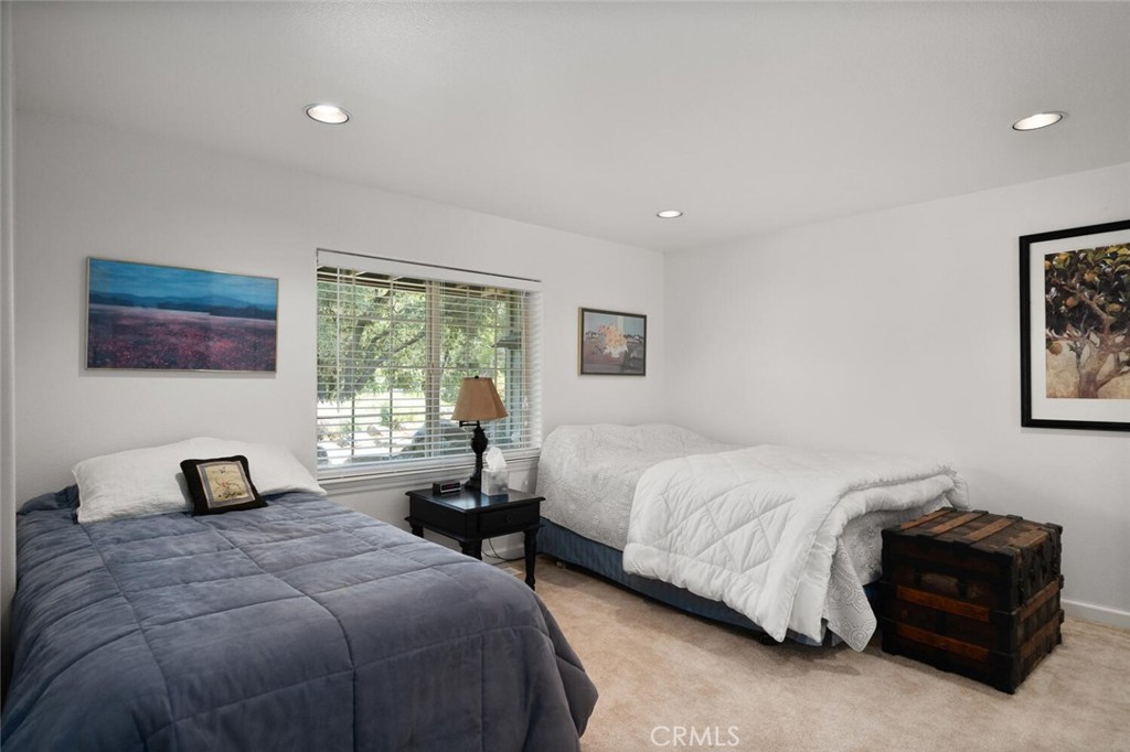 5056 Hooper Lane Chico, CA 95928 - Photo 38 of 57 a bedroom with a bed and a window