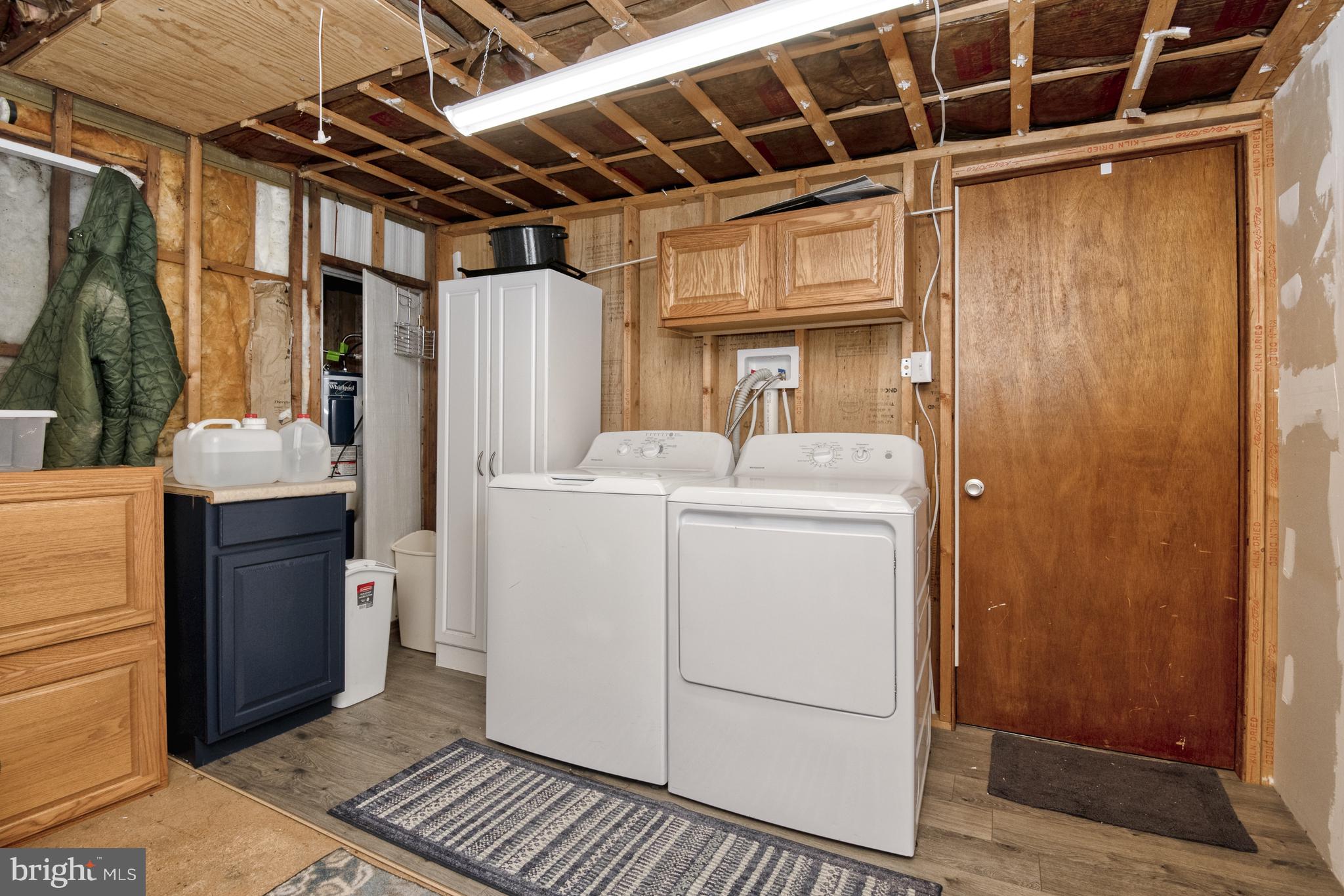 25804 Blue Ridge Street, Unit 4203 Millsboro, DE 19966 - Photo 28 of 35 Laundry room can accommodate another bathroom