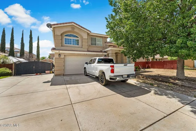 a car parked in front of a house