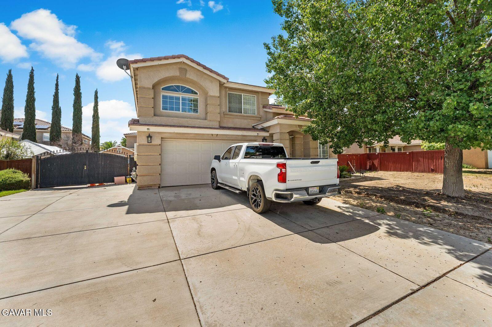a car parked in front of a house