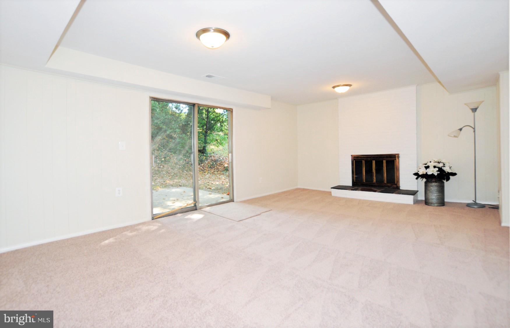 6901 Millwood Road Bethesda, MD 20817 - Photo 12 of 28 Family Room w/wood burning fireplace