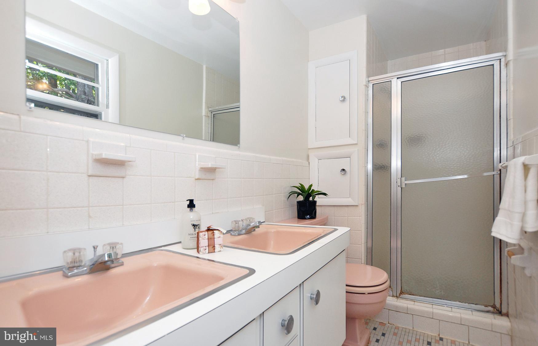 6901 Millwood Road Bethesda, MD 20817 - Photo 18 of 28 Master Bath w/double vanity and clothes chute