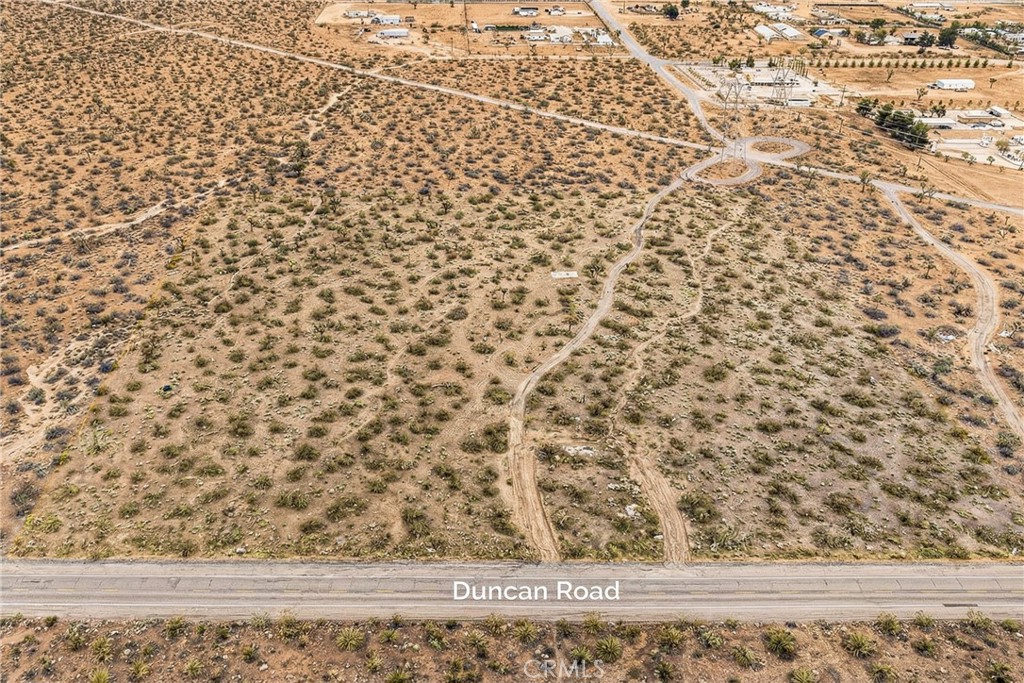 1 Duncan Road Phelan, CA 92371 - Photo 7 of 8 view of a dry yard with wooden floor