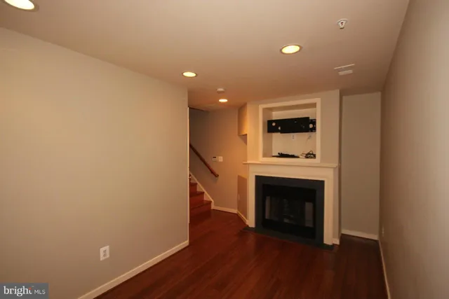 a view of a livingroom with a fireplace