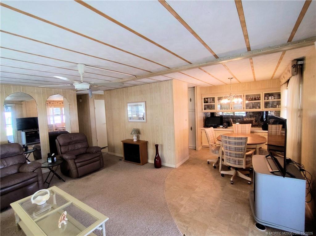 2540 Southeast Penny Lane Stuart, FL 34994 - Photo 13 of 62 a living room with furniture