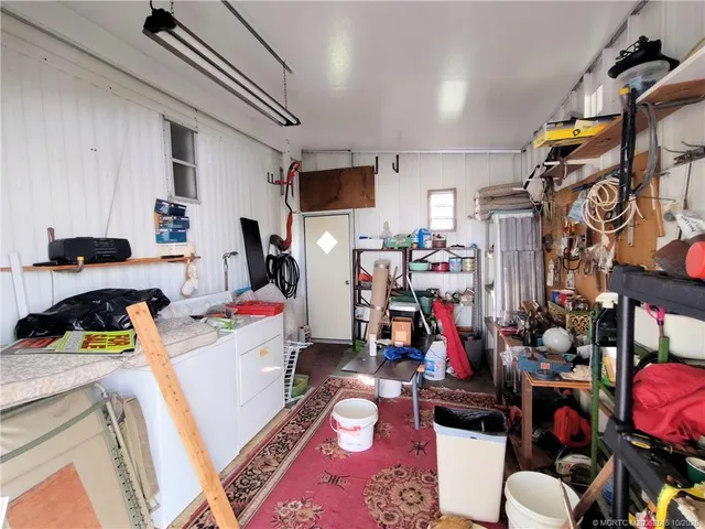 a view of a backyard with a patio and dining space