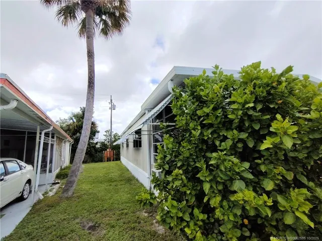 a view of a swimming pool with seating area