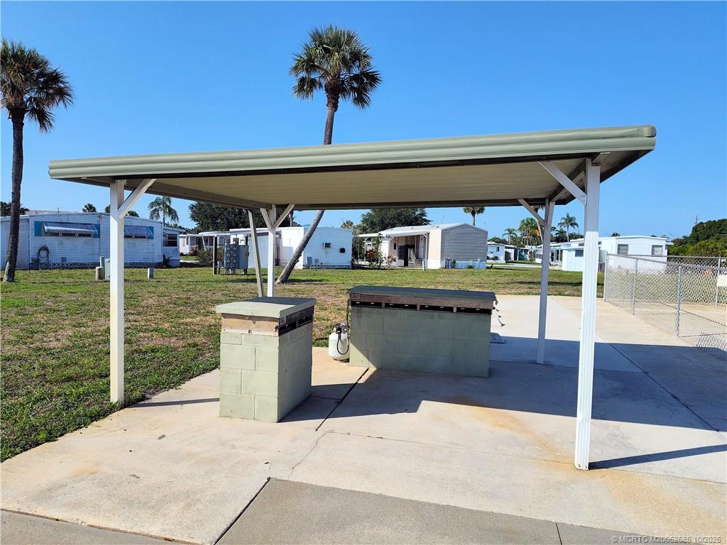 2540 Southeast Penny Lane Stuart, FL 34994 - Photo 48 of 62 a view of a swimming pool with a patio