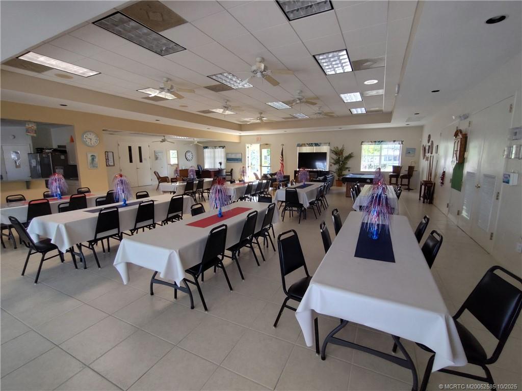 2540 Southeast Penny Lane Stuart, FL 34994 - Photo 57 of 62 a view of a dining room with furniture