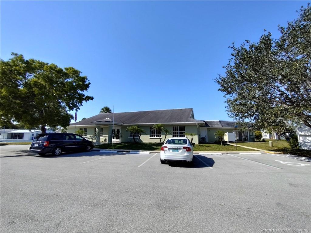 2540 Southeast Penny Lane Stuart, FL 34994 - Photo 62 of 62 a car parked in front of a building