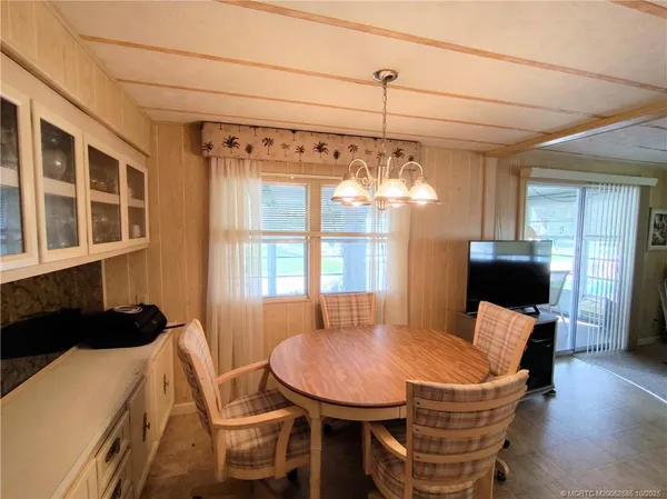 a view of a dining room with furniture
