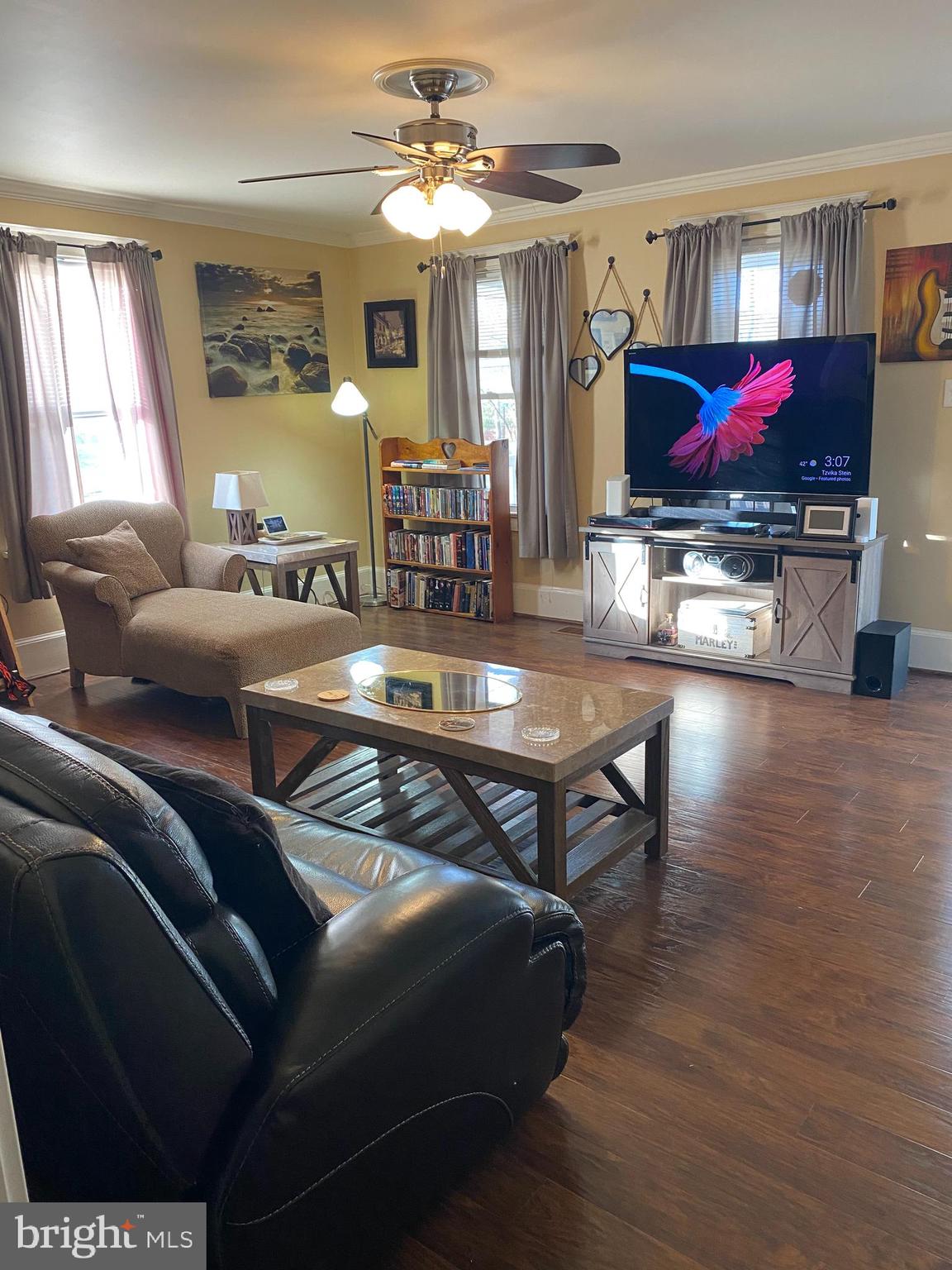 2419 Newcombtown Road Millville, NJ 08332 - Photo 10 of 34 a living room with furniture and a flat screen tv