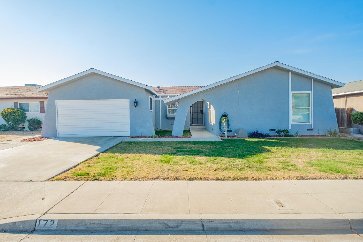 a front view of house with yard