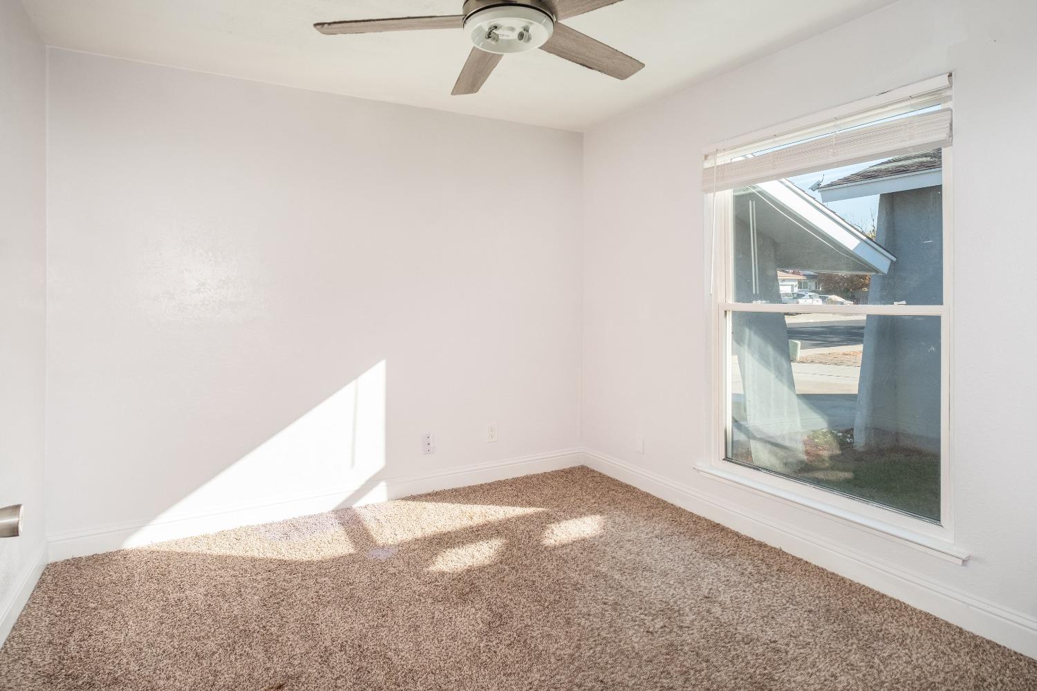 172 West Swift Avenue Clovis, CA 93612 - Photo 13 of 22 a view of a room with rack on the wall