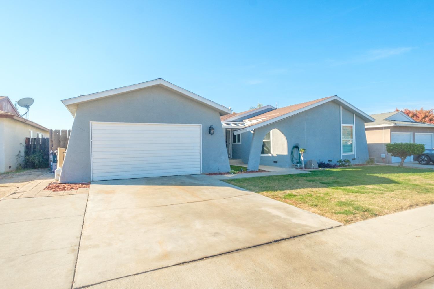 172 West Swift Avenue Clovis, CA 93612 - Photo 2 of 22 a house view with a outdoor space