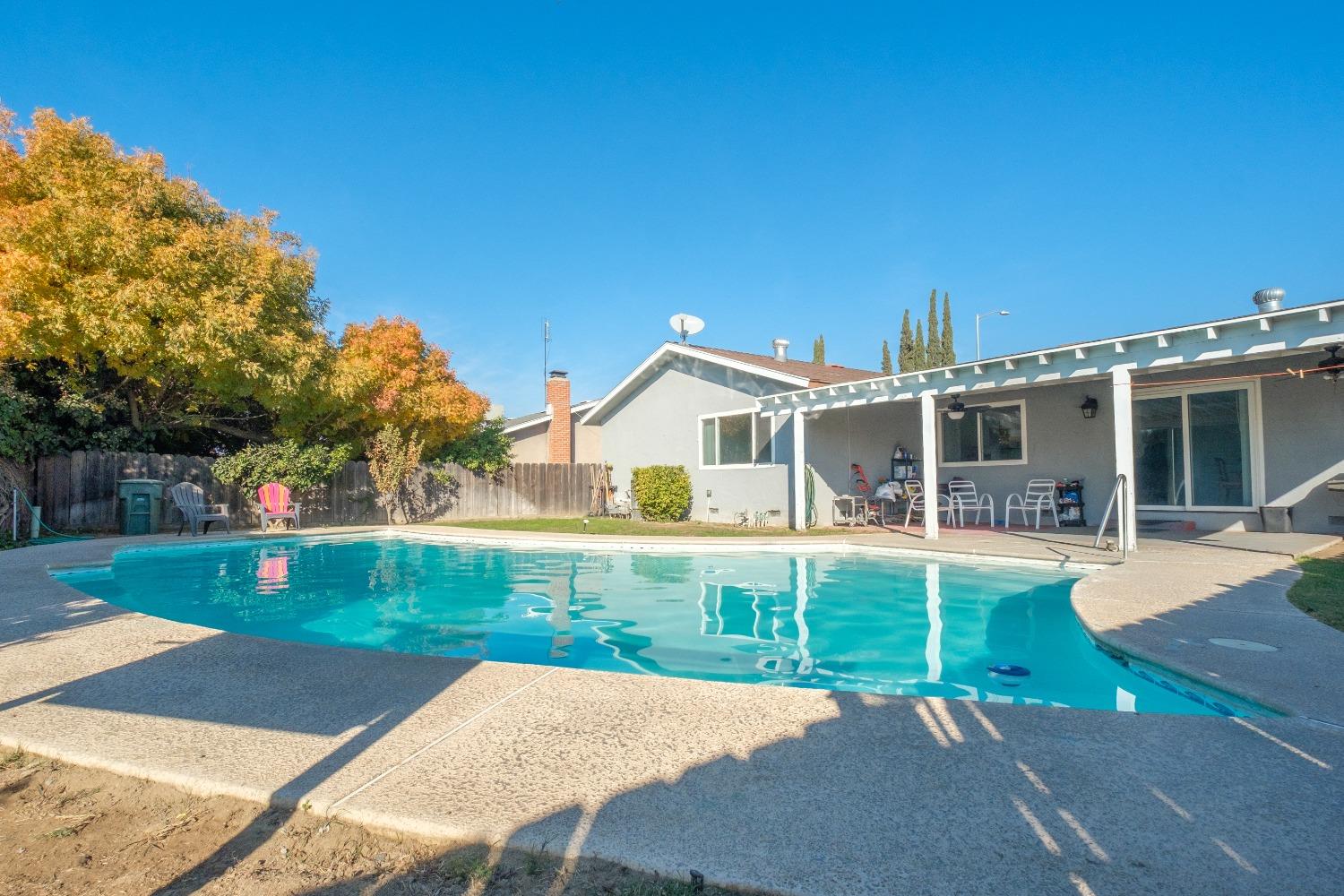 172 West Swift Avenue Clovis, CA 93612 - Photo 21 of 22 a view of a house with a yard and sitting area