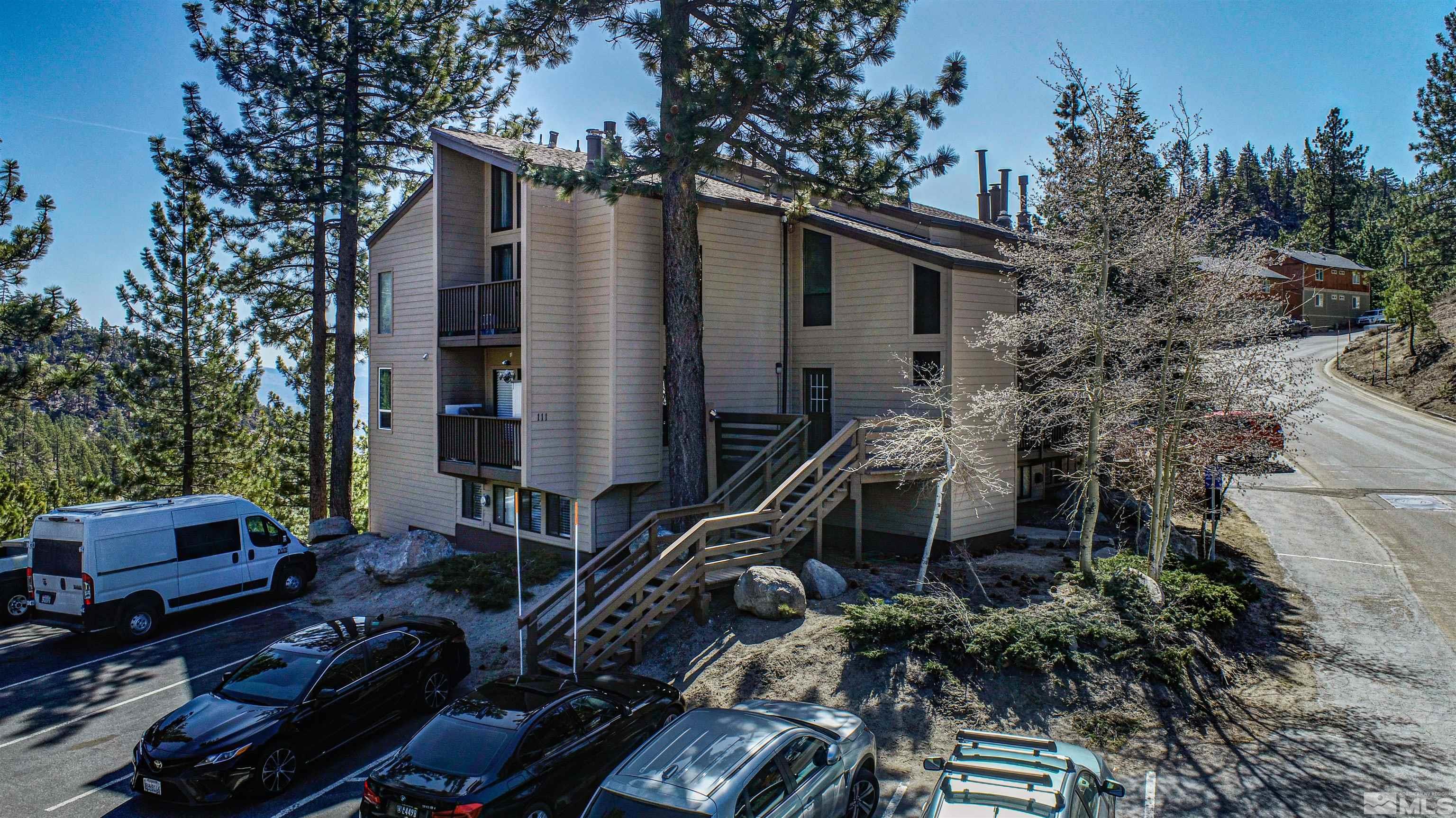 111 Tramway Drive, Unit 2 Stateline, NV 89449 - Photo 3 of 37 a couple of cars parked in front of a house