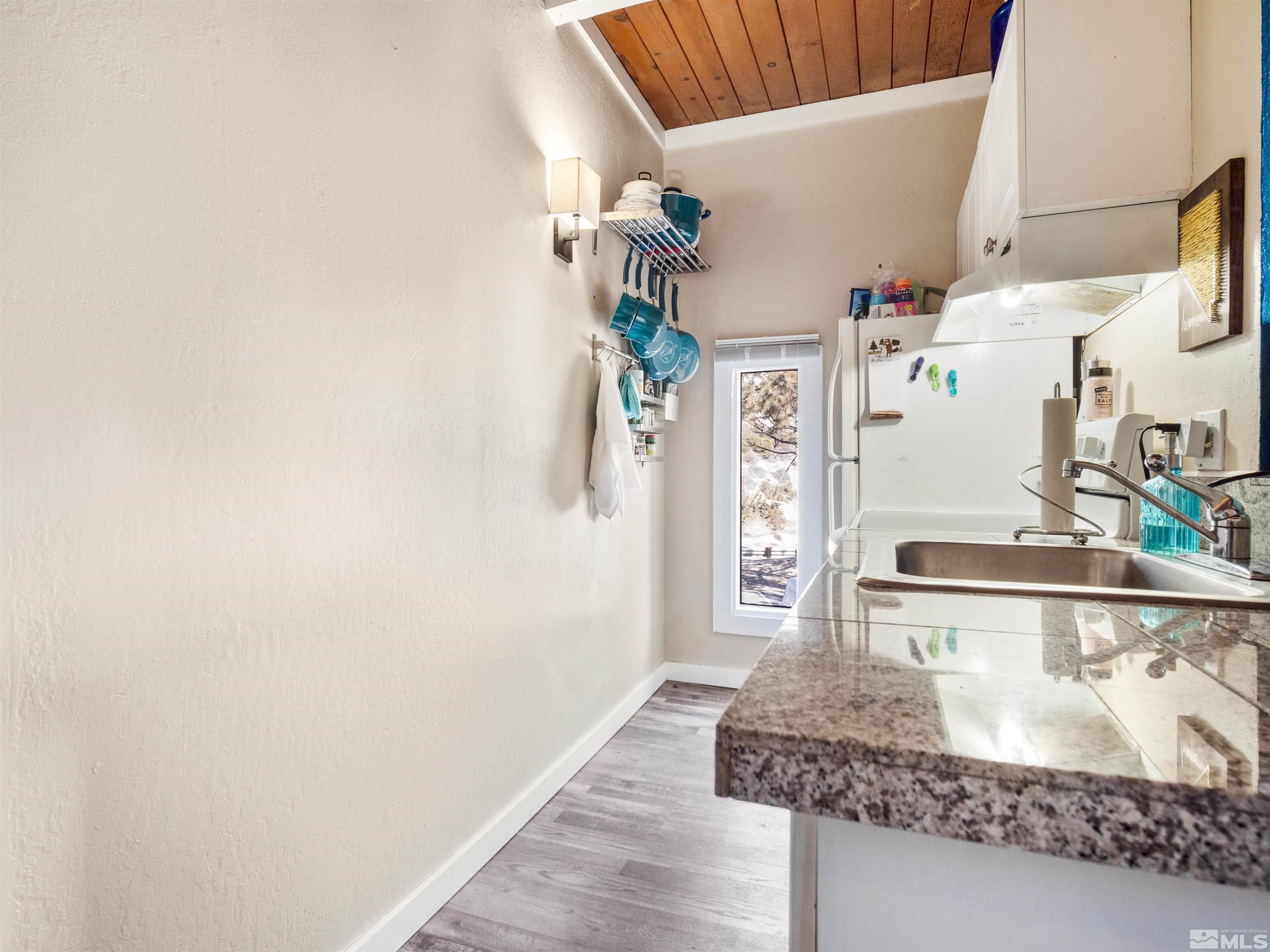 111 Tramway Drive, Unit 2 Stateline, NV 89449 - Photo 10 of 37 a view of living room with furniture and wooden floor