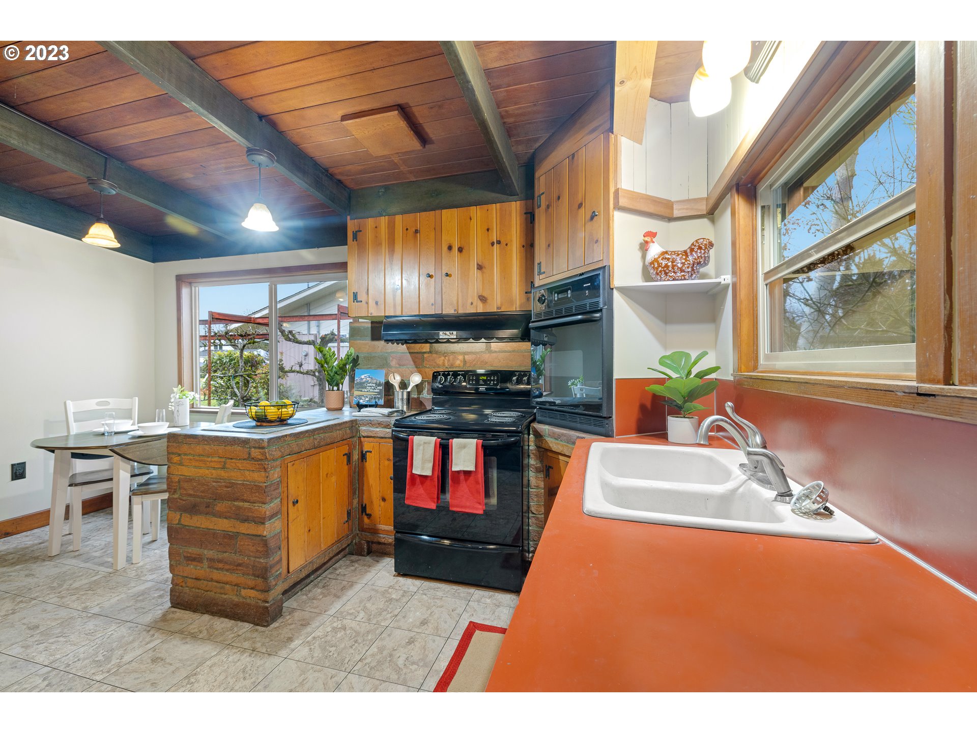 2635 Nova Street Springfield, OR 97477 - Photo 11 of 31 a kitchen with stainless steel appliances granite countertop a stove a sink and a microwave