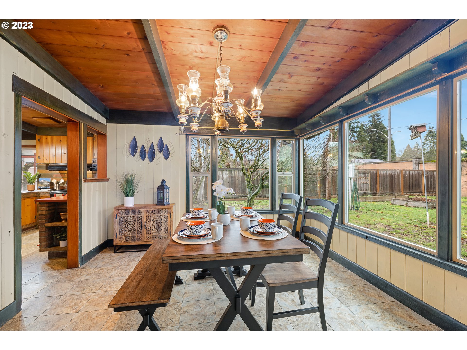 2635 Nova Street Springfield, OR 97477 - Photo 13 of 31 a view of a dining room with furniture wooden floor and chandelier