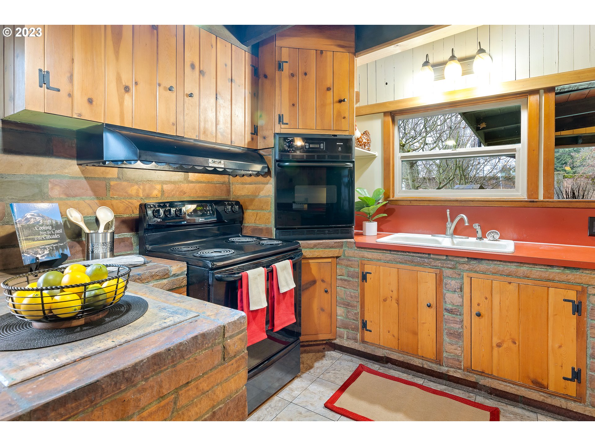2635 Nova Street Springfield, OR 97477 - Photo 10 of 31 a kitchen with stainless steel appliances granite countertop a stove and a sink