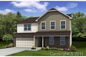 8739 Balsam Bay Road Charlotte, NC 28227 - Photo 1 of 1 a front view of a house with a yard