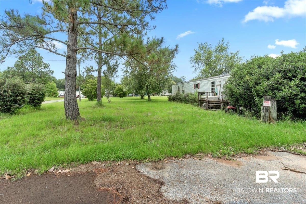 8296 Bennett Road North Grand Bay, AL 36541 - Photo 1 of 16 View of yard