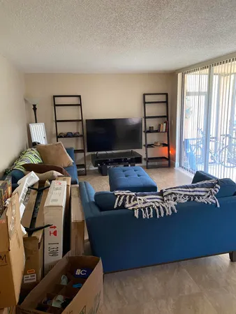 a workspace with furniture and a window