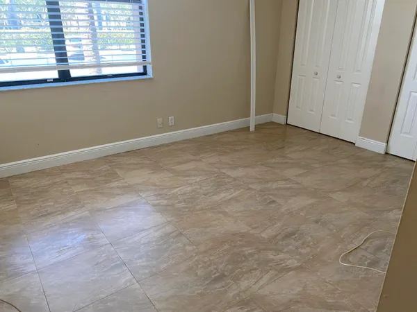 an empty room with windows