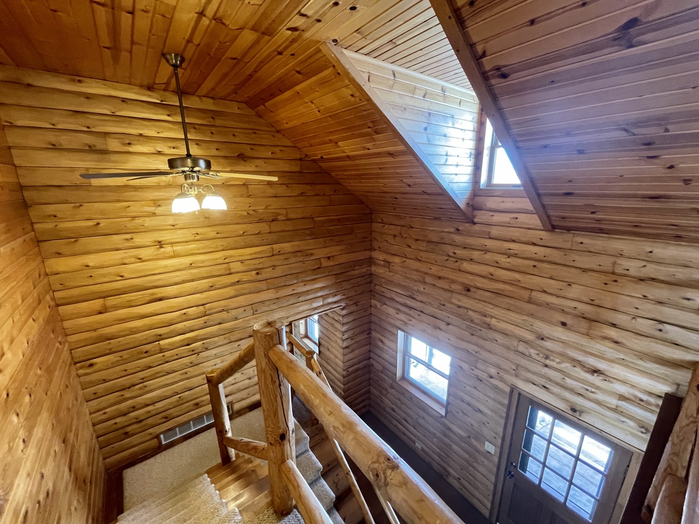 -n575 Pouley Road Elburn, IL 60119 - Photo 12 of 27 a view of an empty room with wooden floor and a window