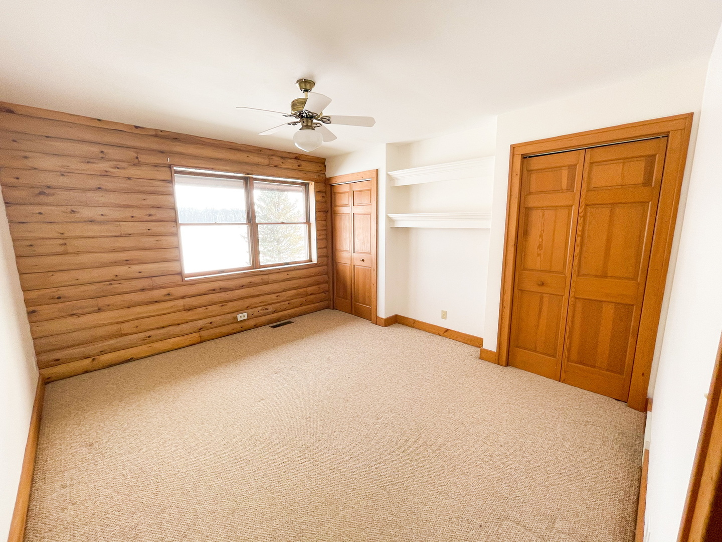 -n575 Pouley Road Elburn, IL 60119 - Photo 13 of 27 an empty room with windows and closet area