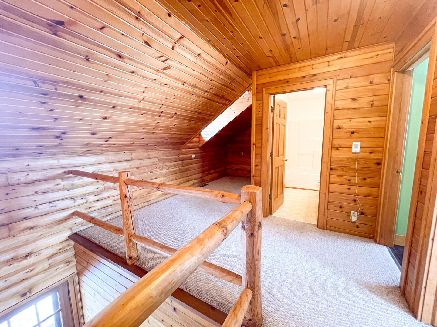 -n575 Pouley Road Elburn, IL 60119 - Photo 16 of 27 a view of a balcony with wooden floor and stairs