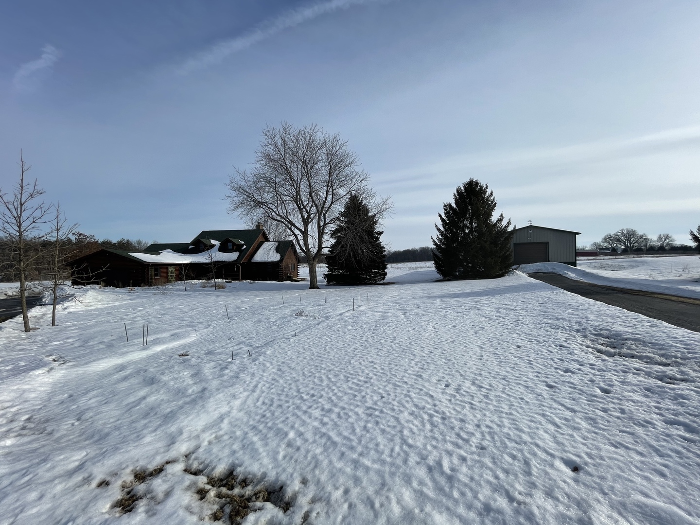 -n575 Pouley Road Elburn, IL 60119 - Photo 22 of 27 a view of dirt yard with a car parked on the road