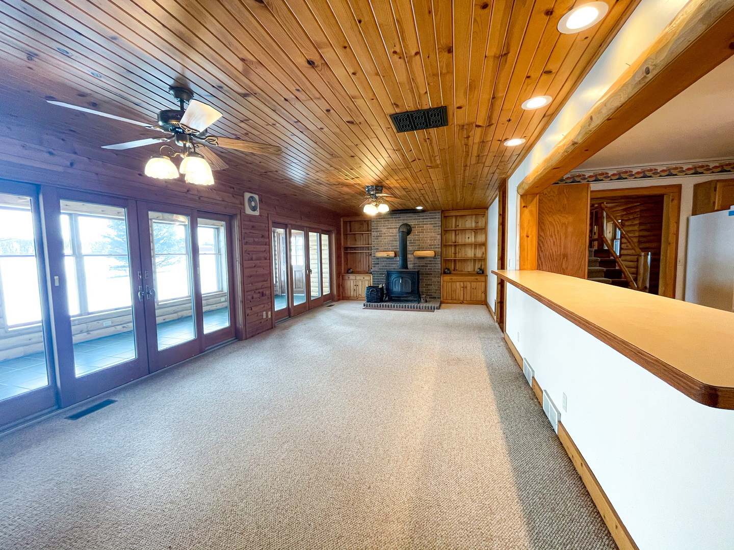 -n575 Pouley Road Elburn, IL 60119 - Photo 4 of 27 a view of a hall with a ceiling fan