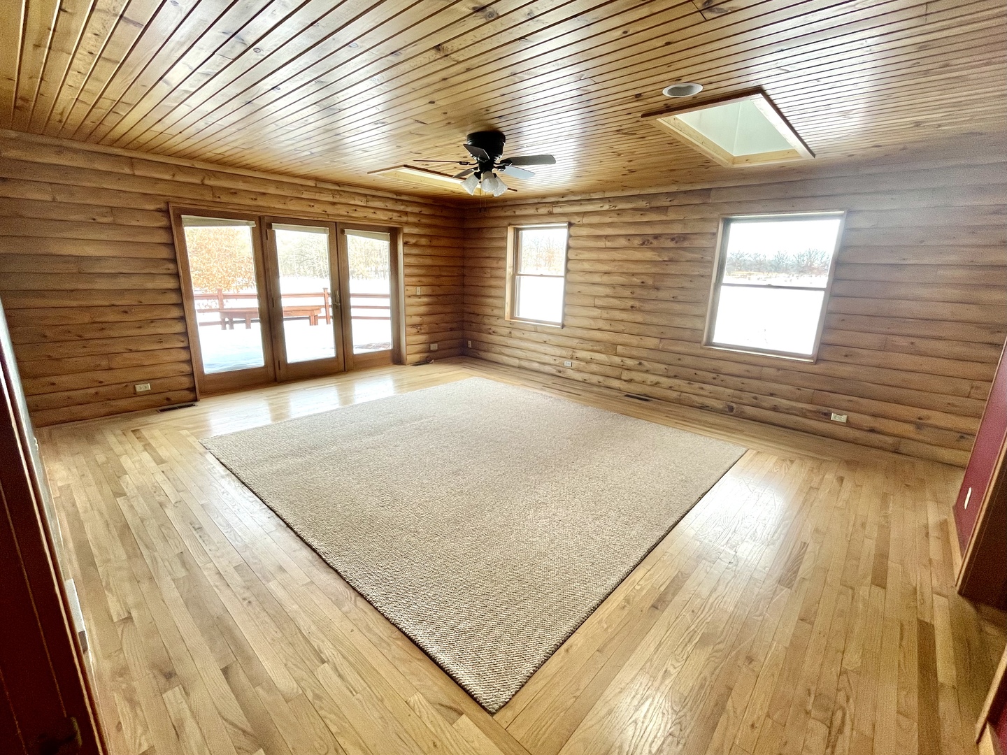 -n575 Pouley Road Elburn, IL 60119 - Photo 6 of 27 a view of empty room with wooden floor and fan