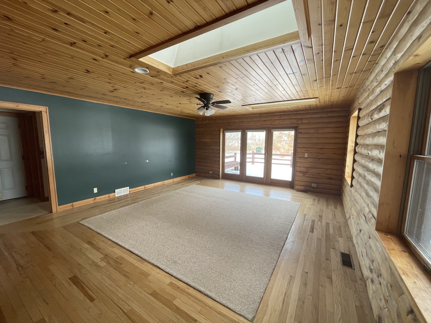 -n575 Pouley Road Elburn, IL 60119 - Photo 8 of 27 a view of empty room with wooden floor and fan