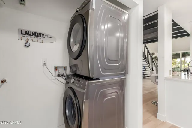 a view of a storage & utility room with washer and dryer